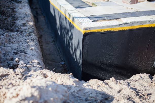 Professional Waterproofing technician working in Ora, IN